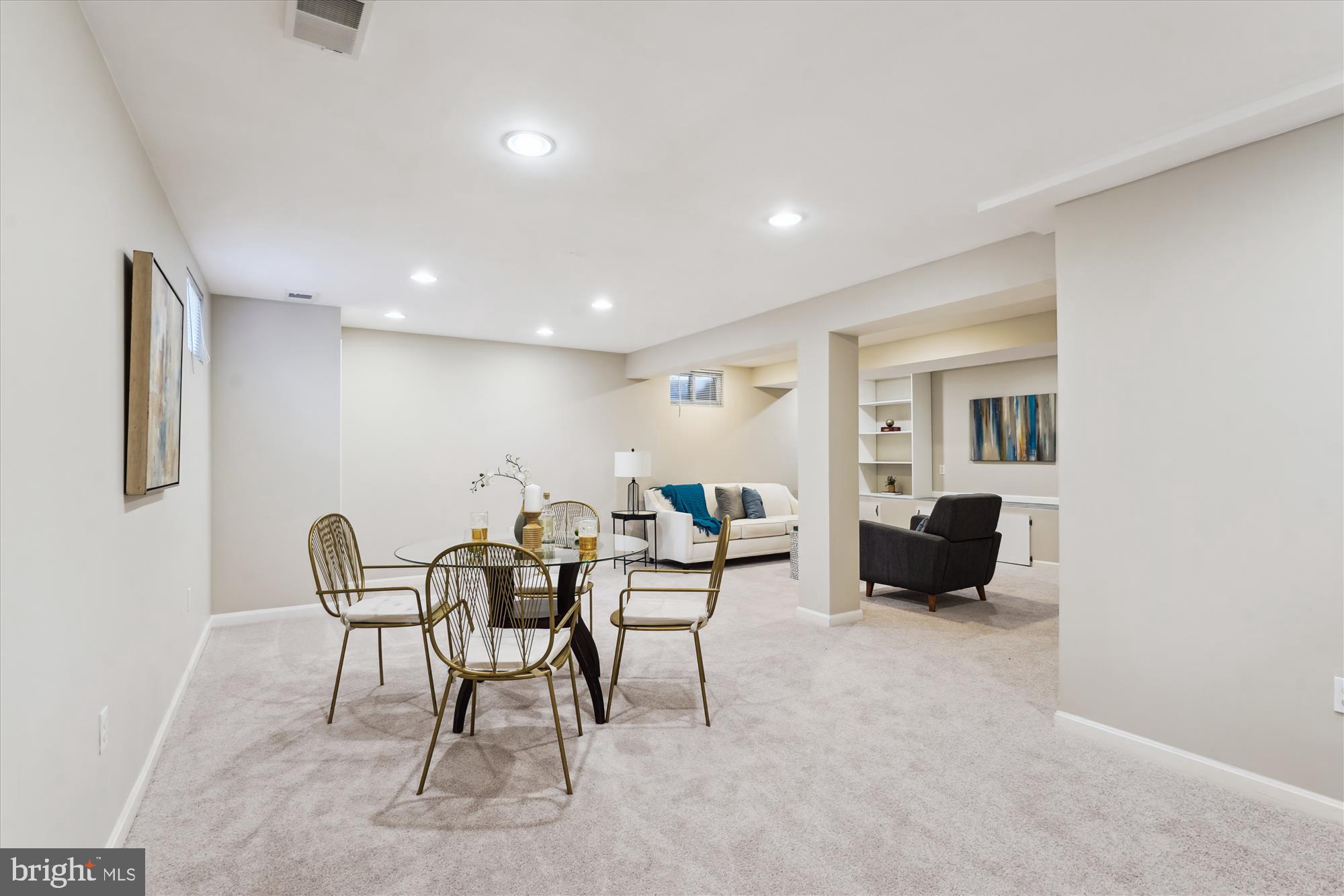 5427 Rilian Court Burke, VA 22015 - Photo 39 of 63 a view of a livingroom with furniture and a flat screen tv