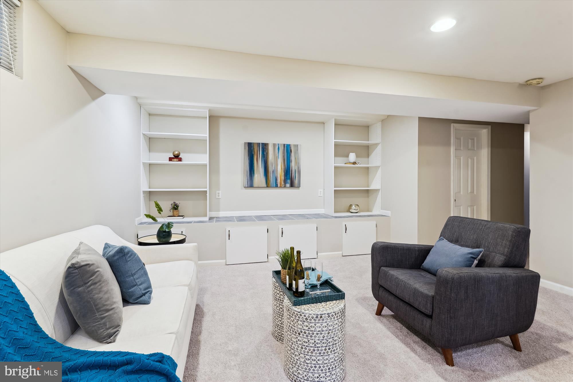 5427 Rilian Court Burke, VA 22015 - Photo 40 of 63 a living room with furniture and a wooden floor
