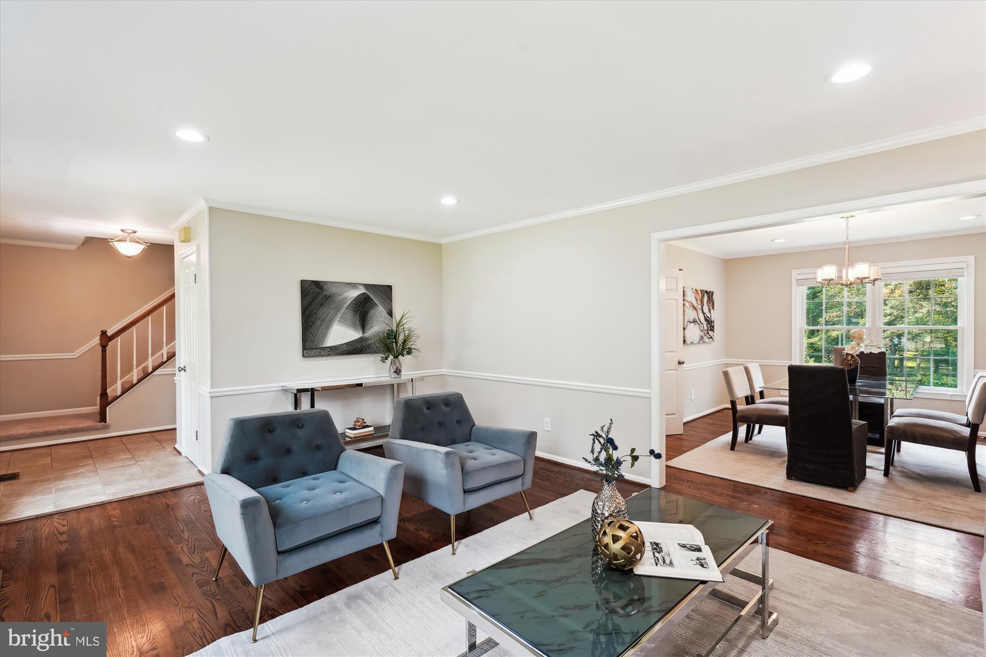 5427 Rilian Court Burke, VA 22015 - Photo 5 of 63 a living room with furniture and a flat screen tv
