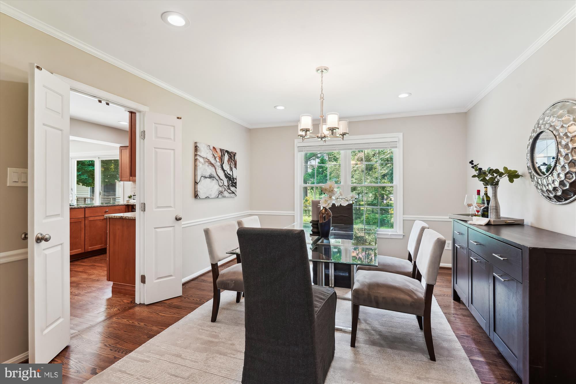5427 Rilian Court Burke, VA 22015 - Photo 7 of 63 a view of a dining room with furniture window and wooden floor