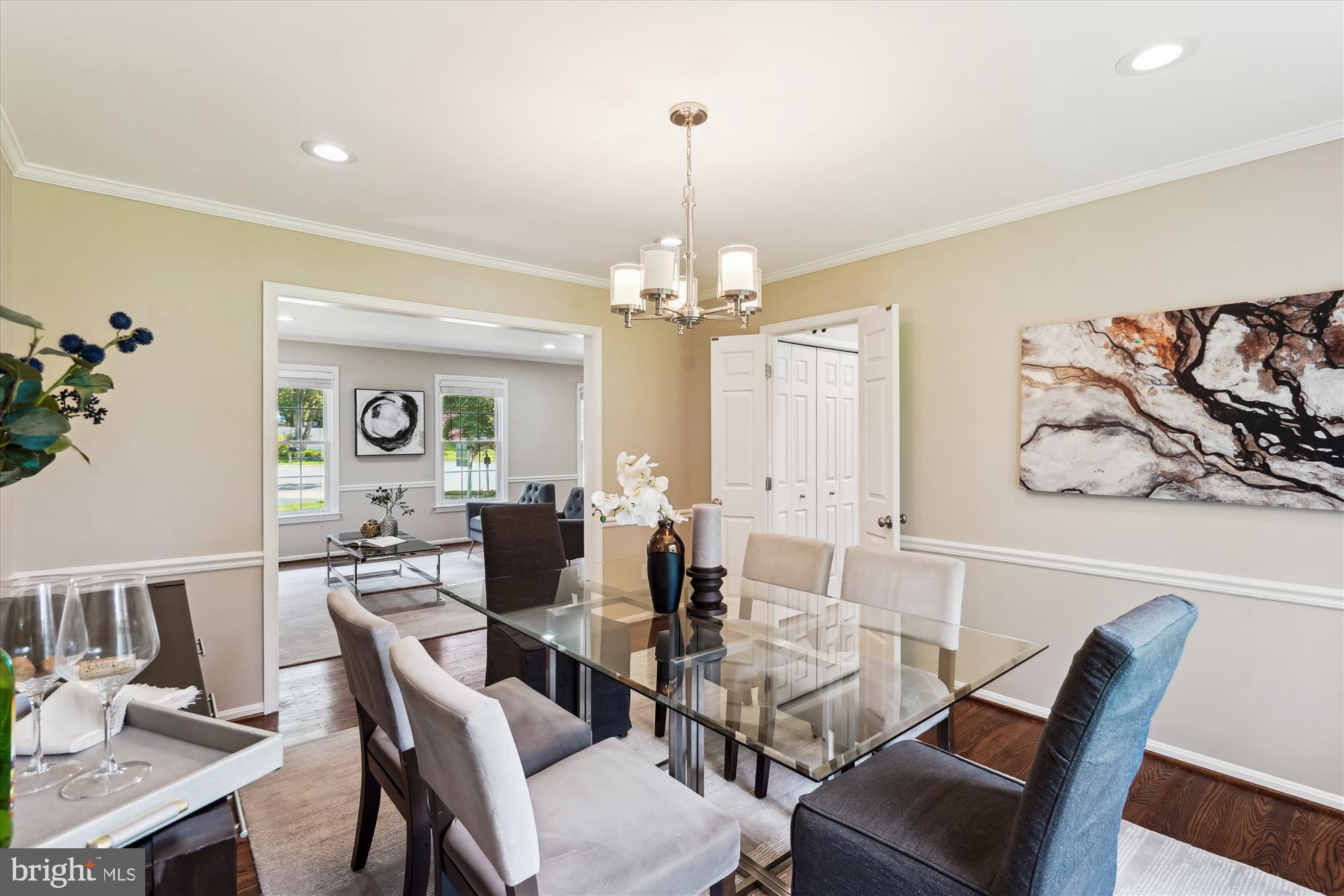 5427 Rilian Court Burke, VA 22015 - Photo 62 of 63 a view of a dining room with furniture window and wooden floor