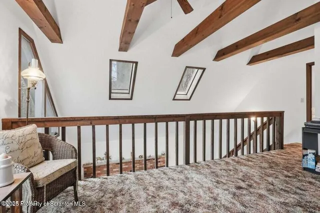 a view of a porch with furniture