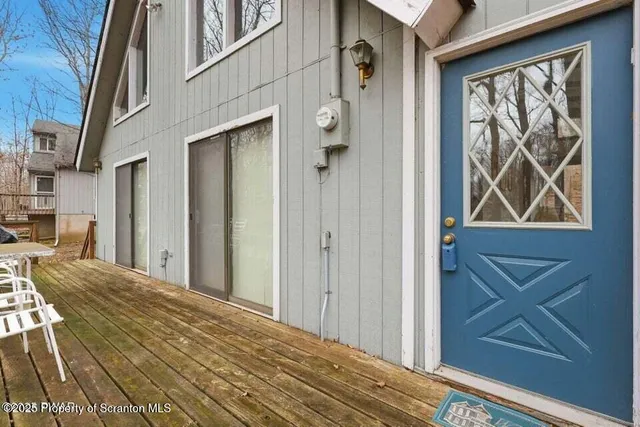 a view of front door with chair