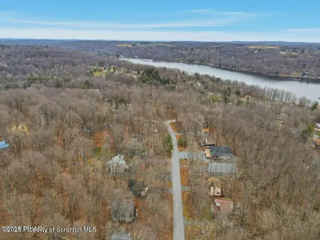 a picture of a bench in front of a wall