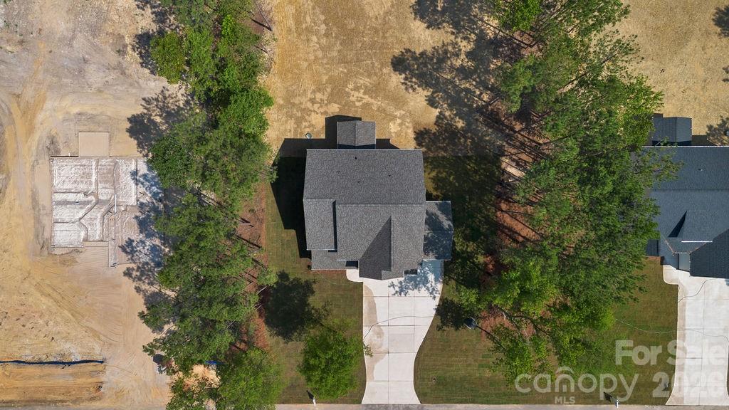 1024 Baylor Grove Road, Unit 19 Monroe, NC 28112 - Photo 5 of 47 an aerial view of a house with outdoor space