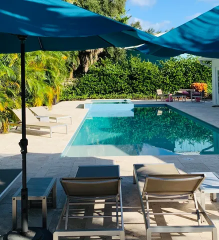 a view of yard with patio