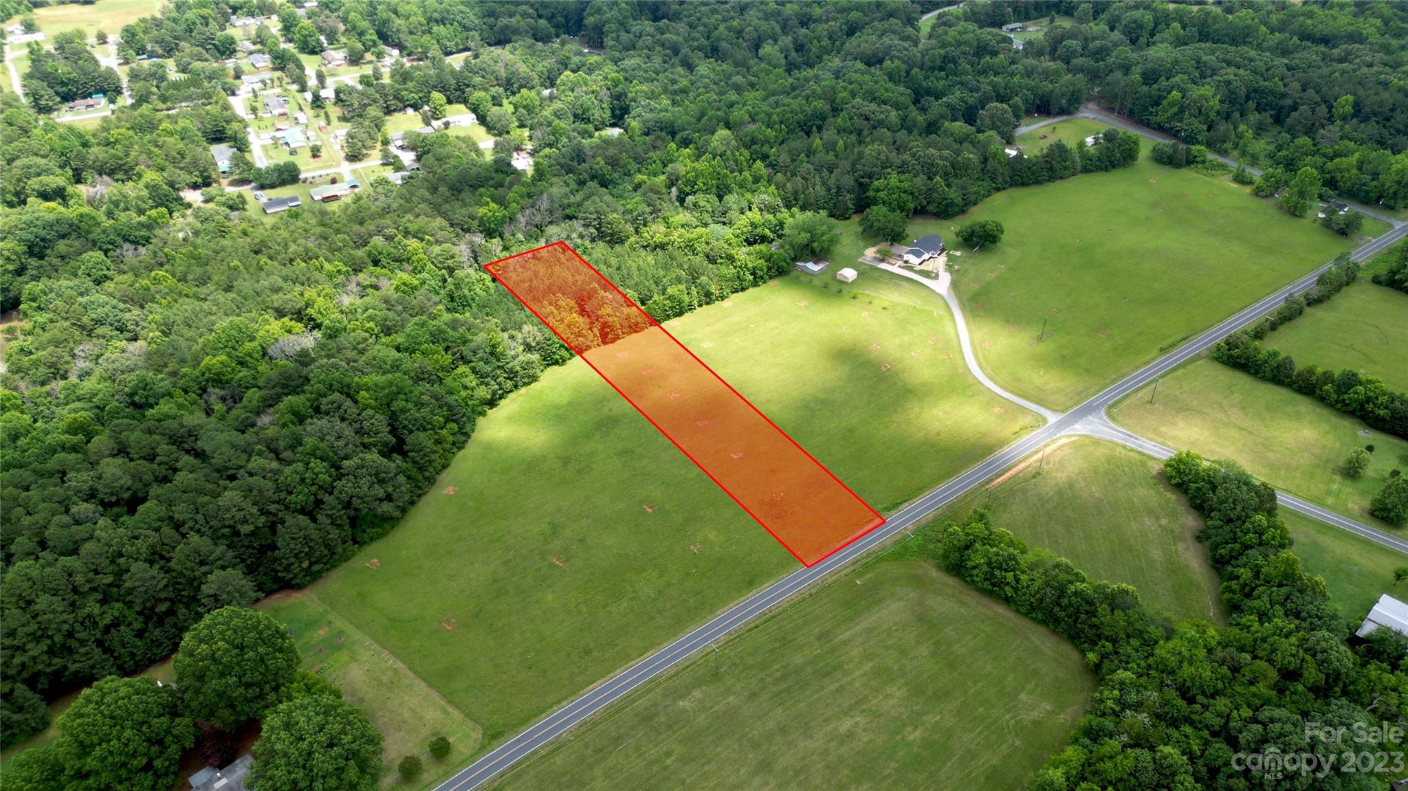 a view of a golf course with a garden