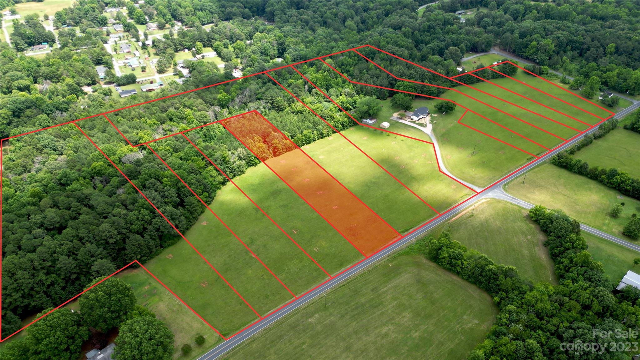 0 Emanuel Church Road, Unit 5 Rockwell, NC 28138 - Photo 3 of 3 a view of a tennis ground with large trees