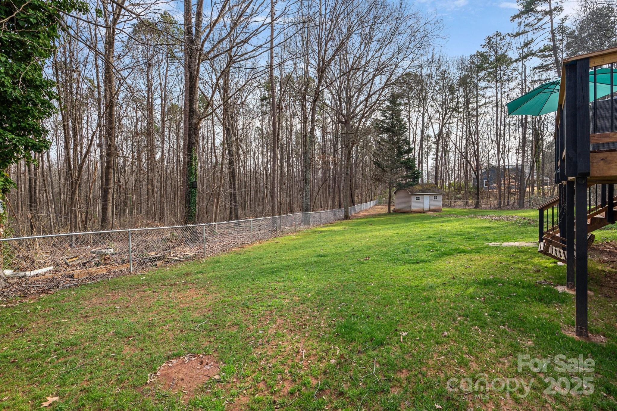 120 Banks Ridge Road Fort Mill, SC 29715 - Photo 31 of 37 a view of a backyard with large trees