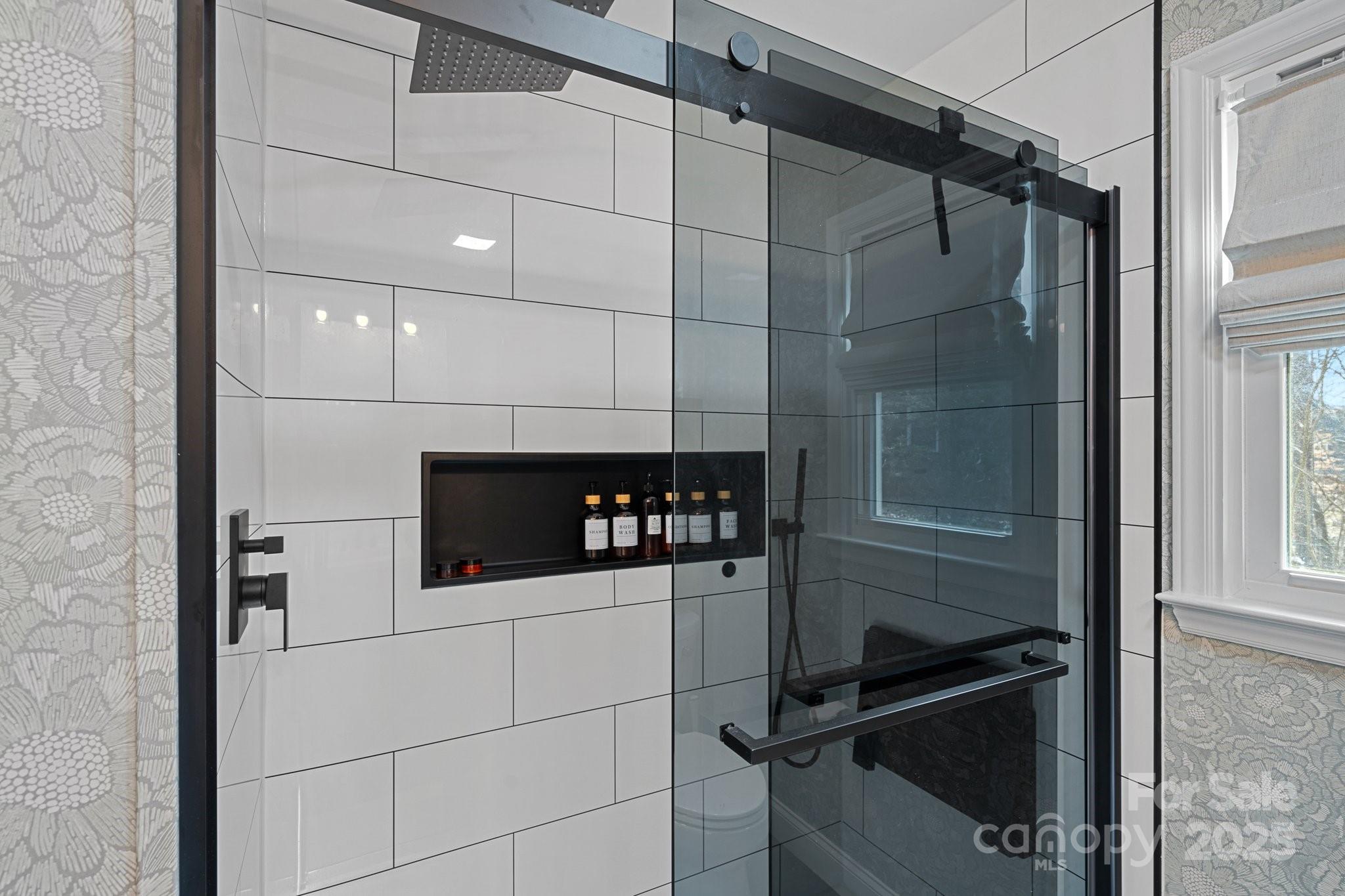 120 Banks Ridge Road Fort Mill, SC 29715 - Photo 7 of 37 a bathroom with a shower and mirror