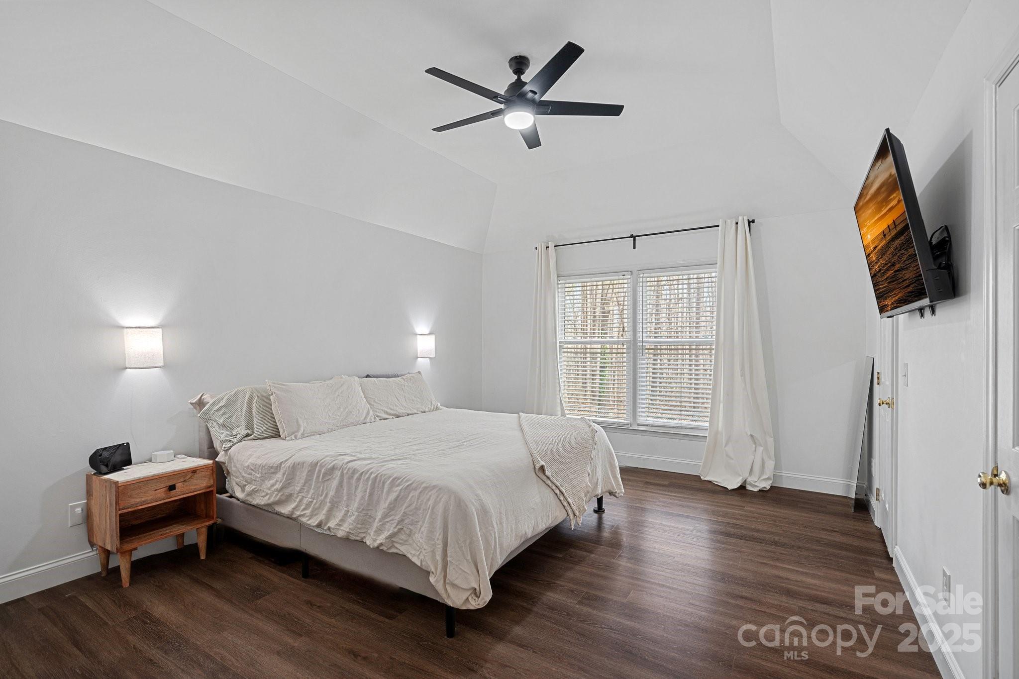 120 Banks Ridge Road Fort Mill, SC 29715 - Photo 8 of 37 a bedroom with a bed and wooden floor