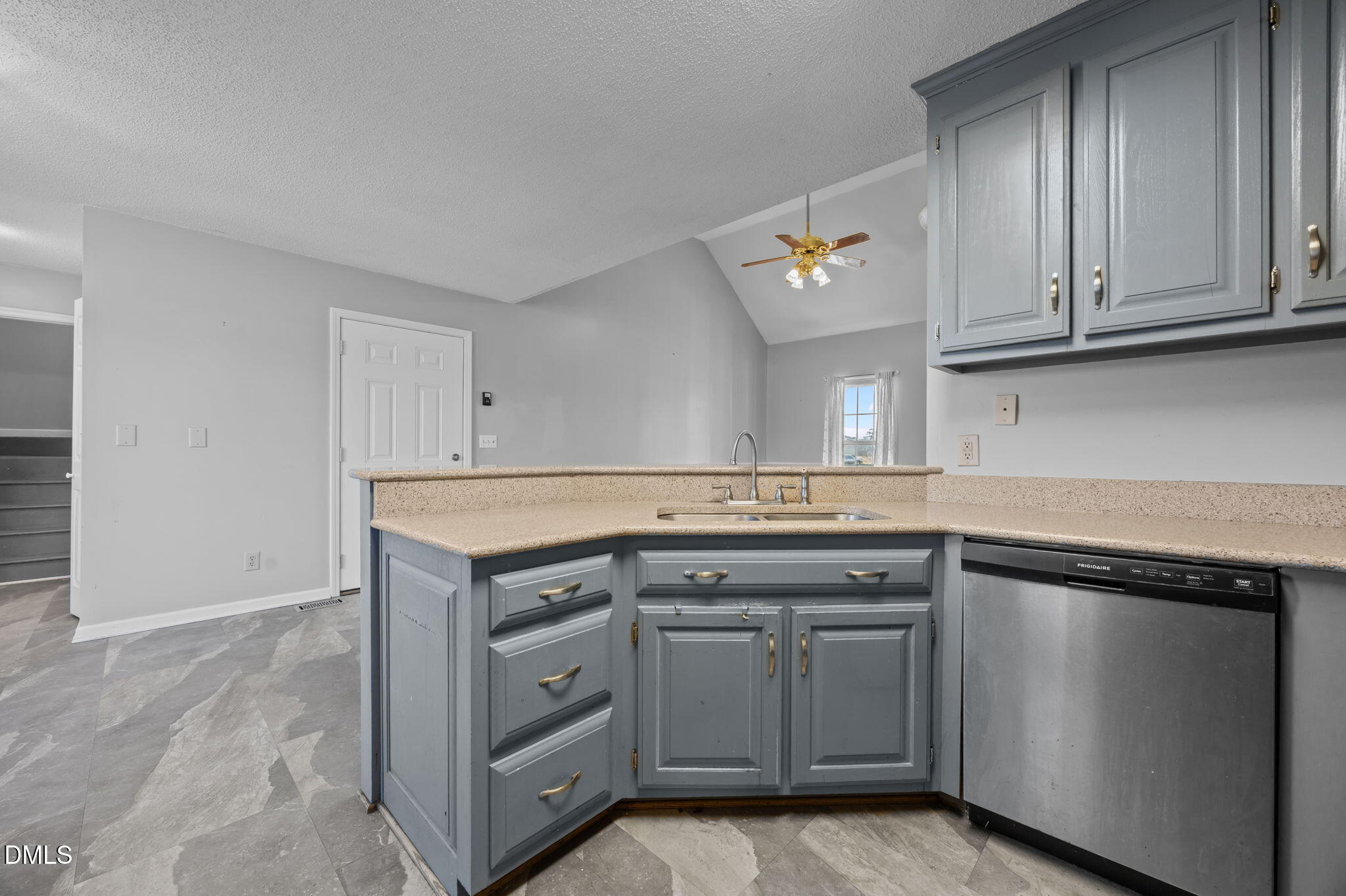 3431 Old Stage Road South Erwin, NC 28339 - Photo 13 of 53 a kitchen with stainless steel appliances granite countertop a stove and a refrigerator
