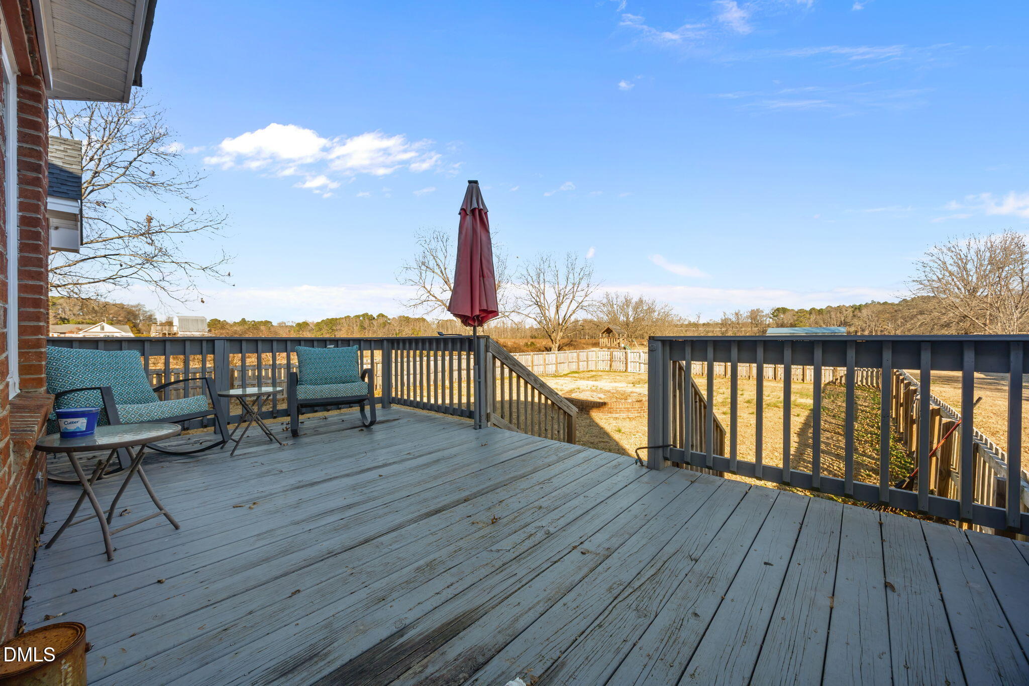 3431 Old Stage Road South Erwin, NC 28339 - Photo 20 of 53 a view of a balcony with wooden floor space and outdoor seating