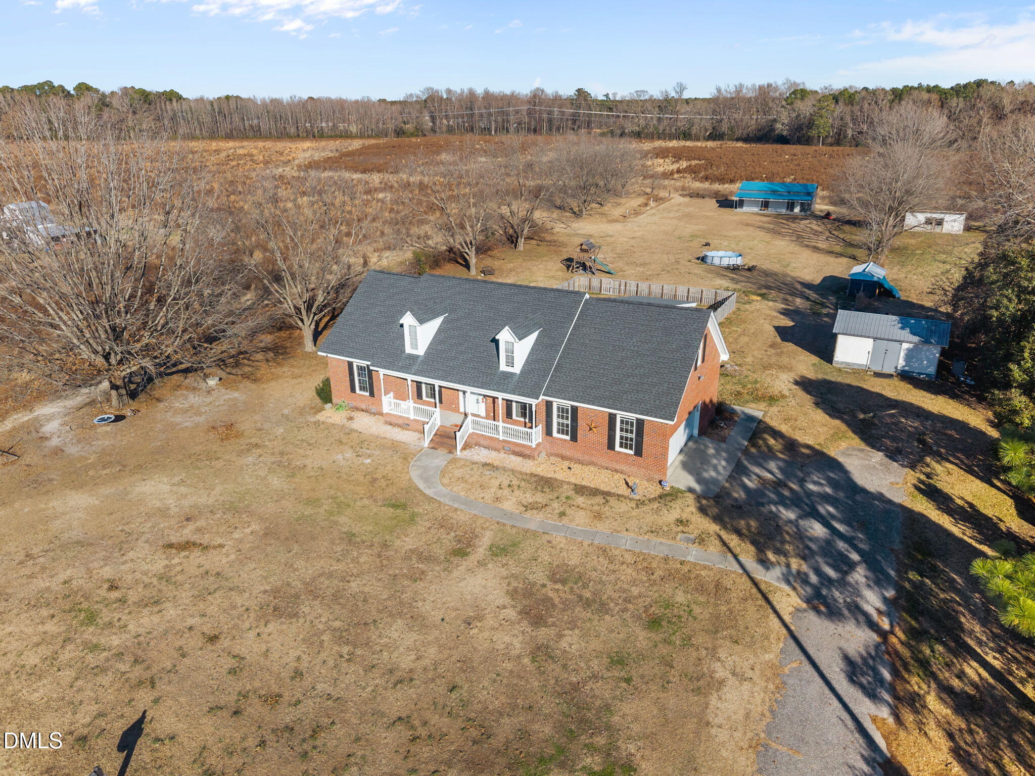 3431 Old Stage Road South Erwin, NC 28339 - Photo 22 of 53 an aerial view of a house with a lake view
