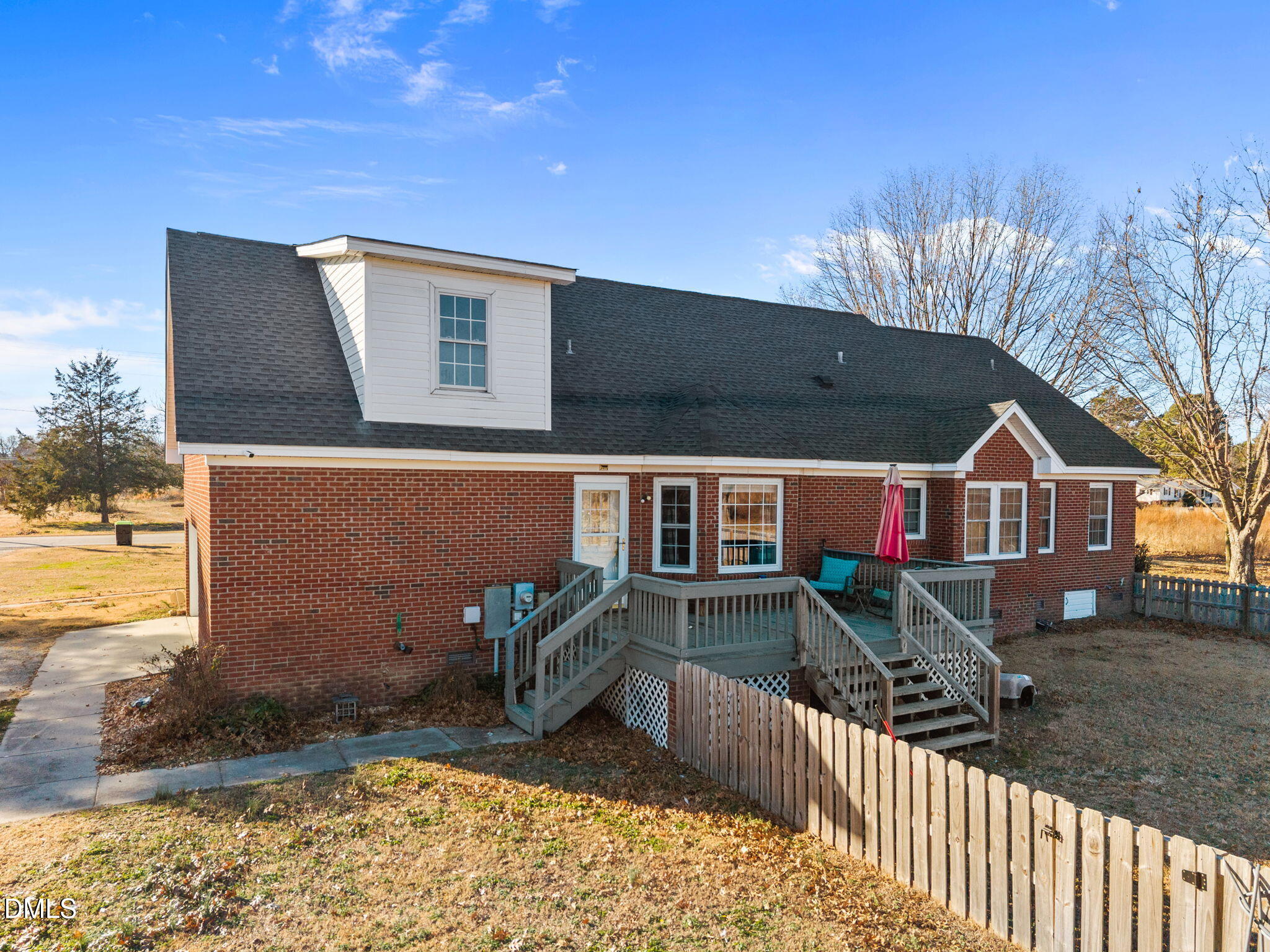 3431 Old Stage Road South Erwin, NC 28339 - Photo 26 of 53 a front view of a house with garden