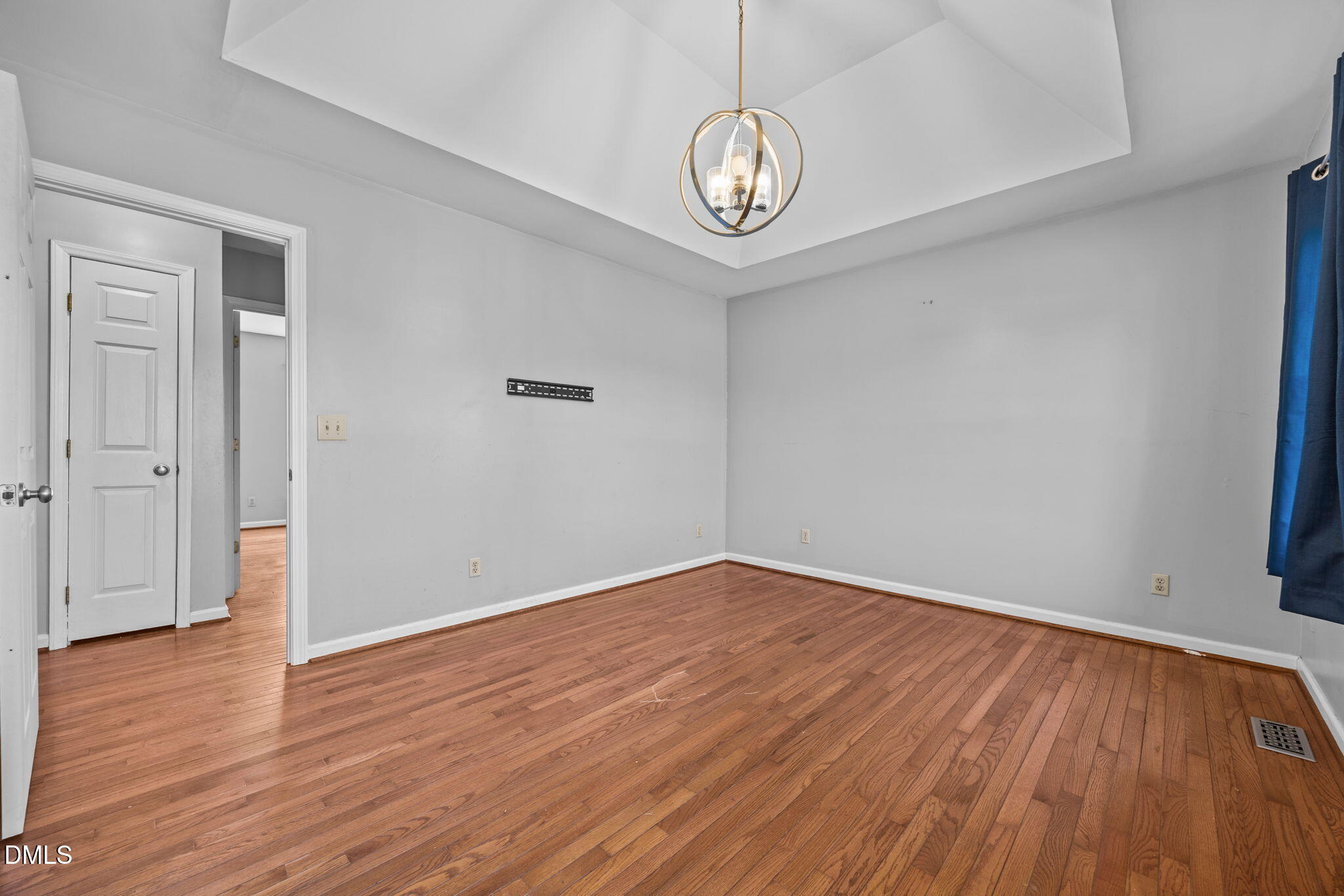 3431 Old Stage Road South Erwin, NC 28339 - Photo 35 of 53 an empty room with wooden floor and windows