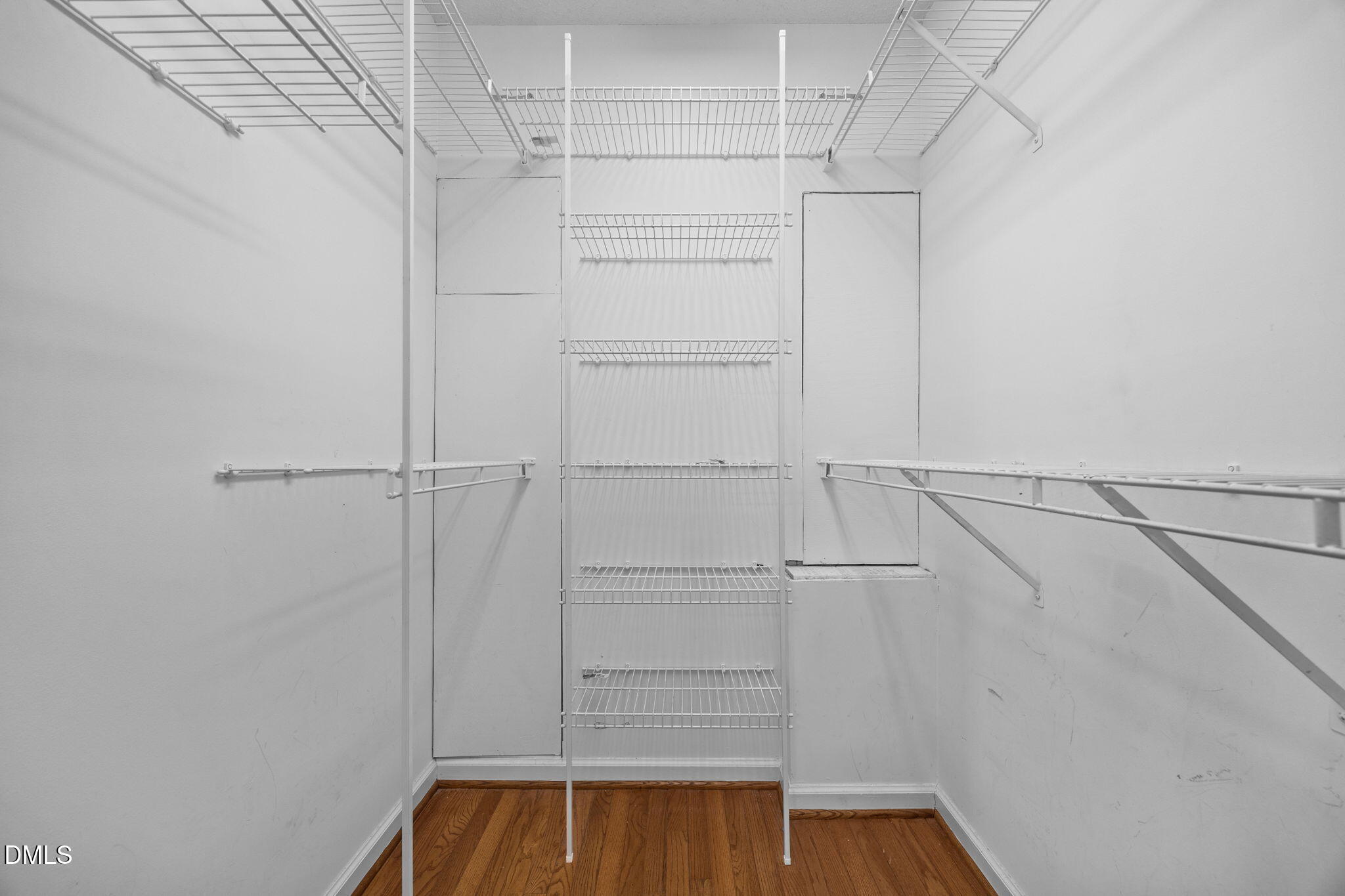 3431 Old Stage Road South Erwin, NC 28339 - Photo 37 of 53 a view of walk in closet with empty racks