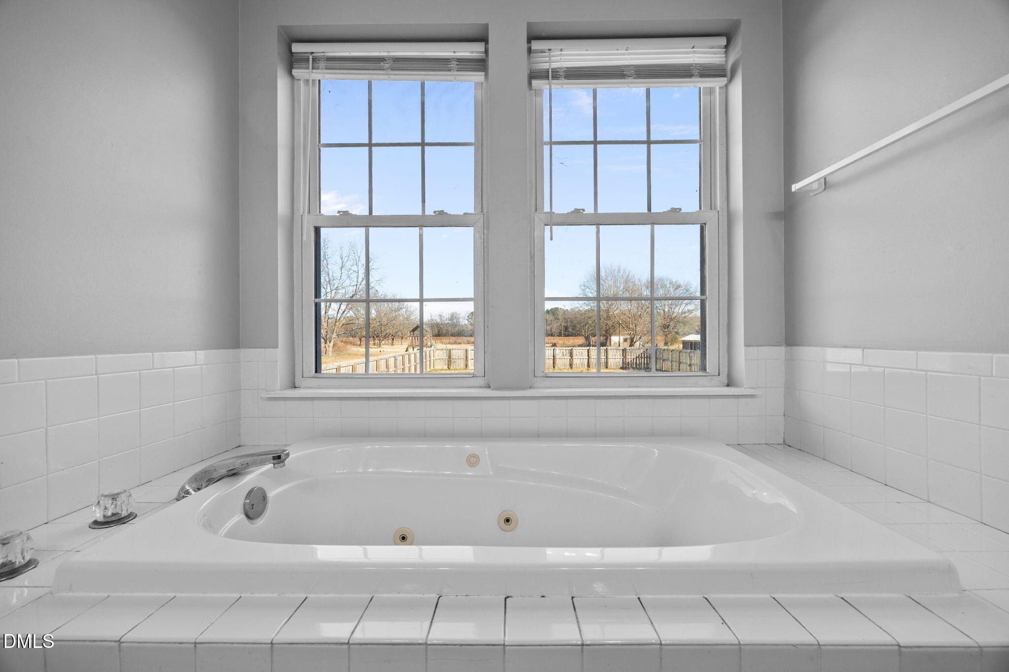 3431 Old Stage Road South Erwin, NC 28339 - Photo 39 of 53 a bath tub sitting in a bathroom next to a window