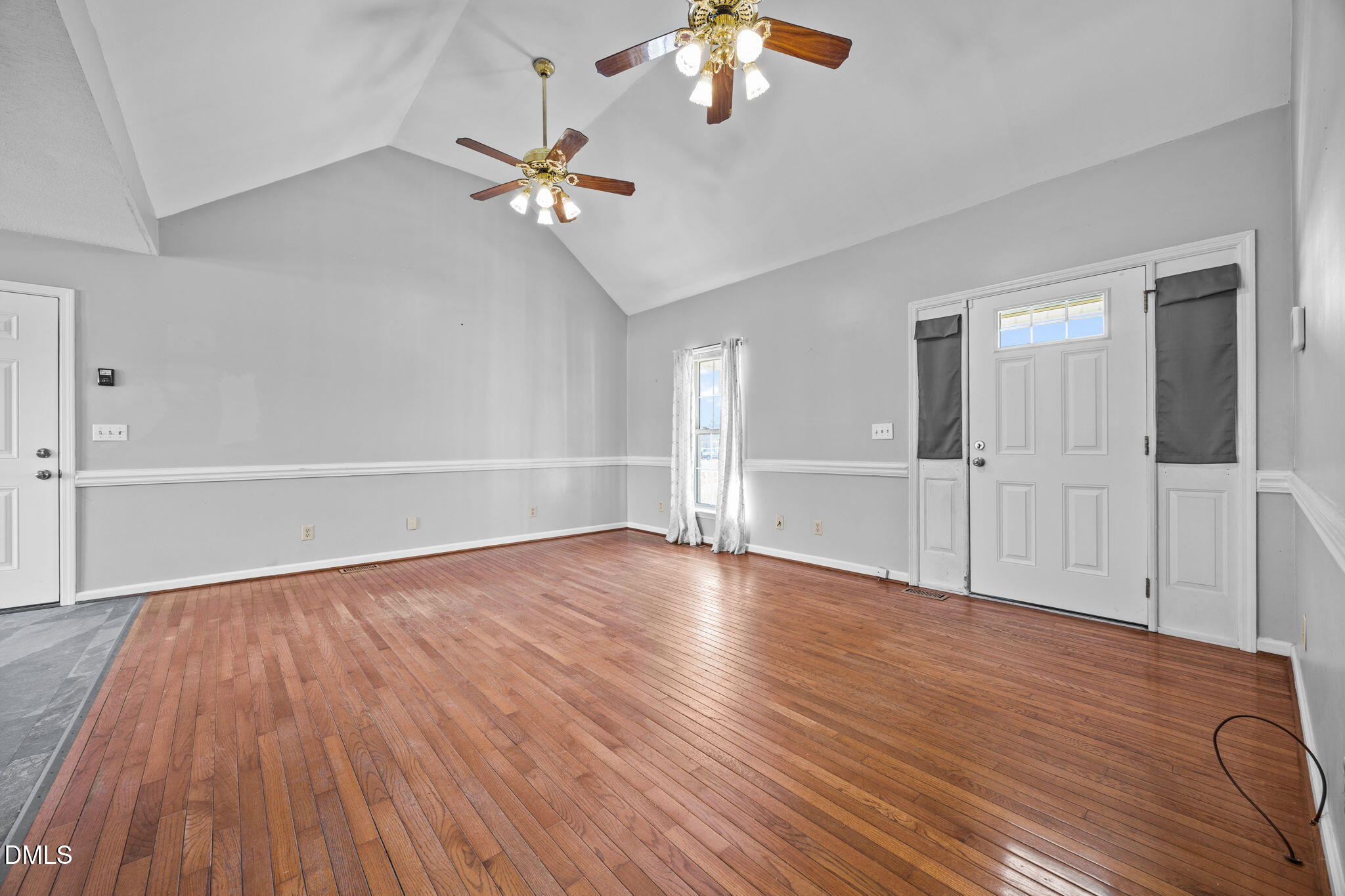 3431 Old Stage Road South Erwin, NC 28339 - Photo 4 of 53 wooden floor in an empty room with a window