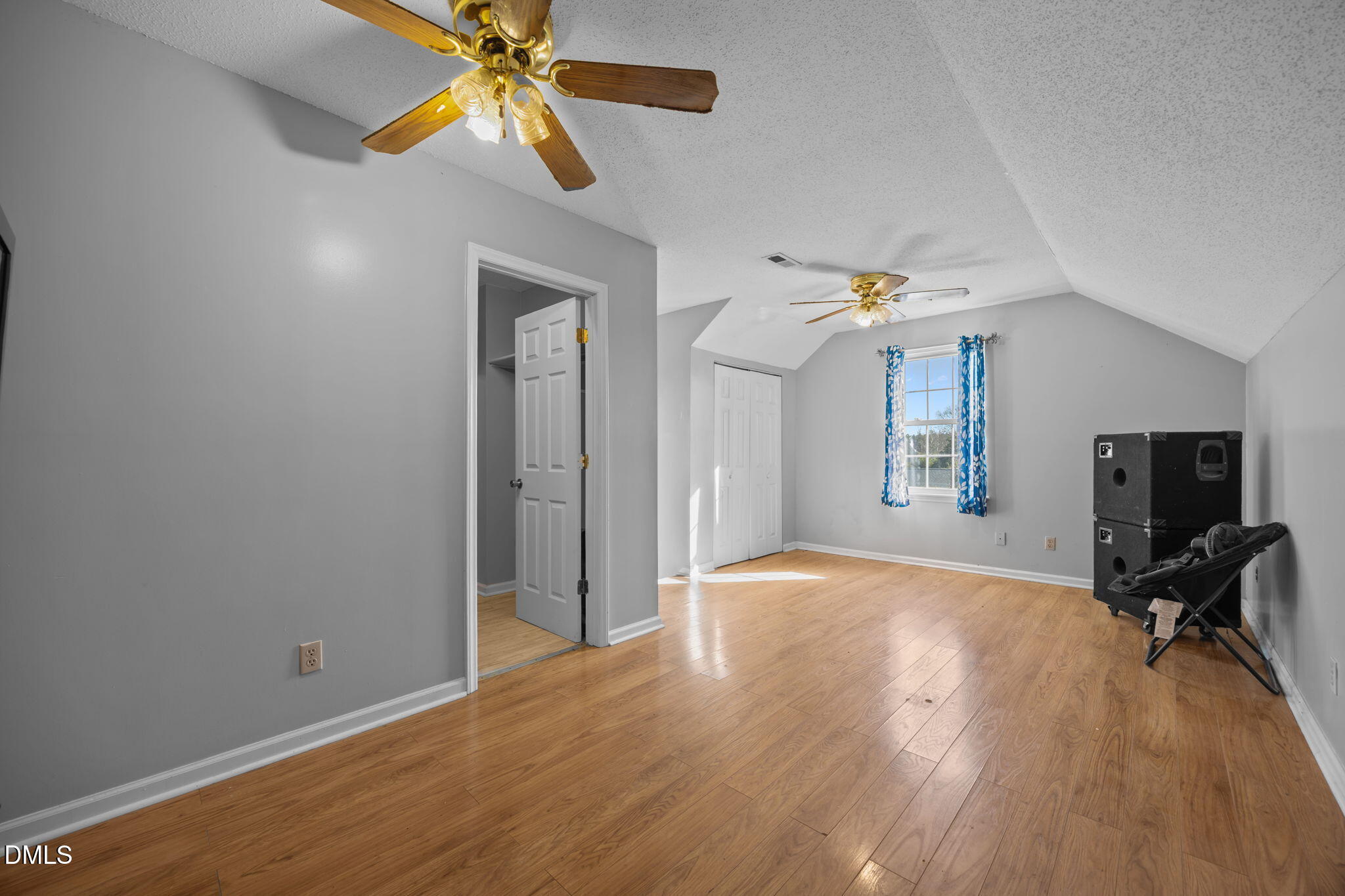 3431 Old Stage Road South Erwin, NC 28339 - Photo 44 of 53 a view of a livingroom with a flat screen tv ceiling fan and window