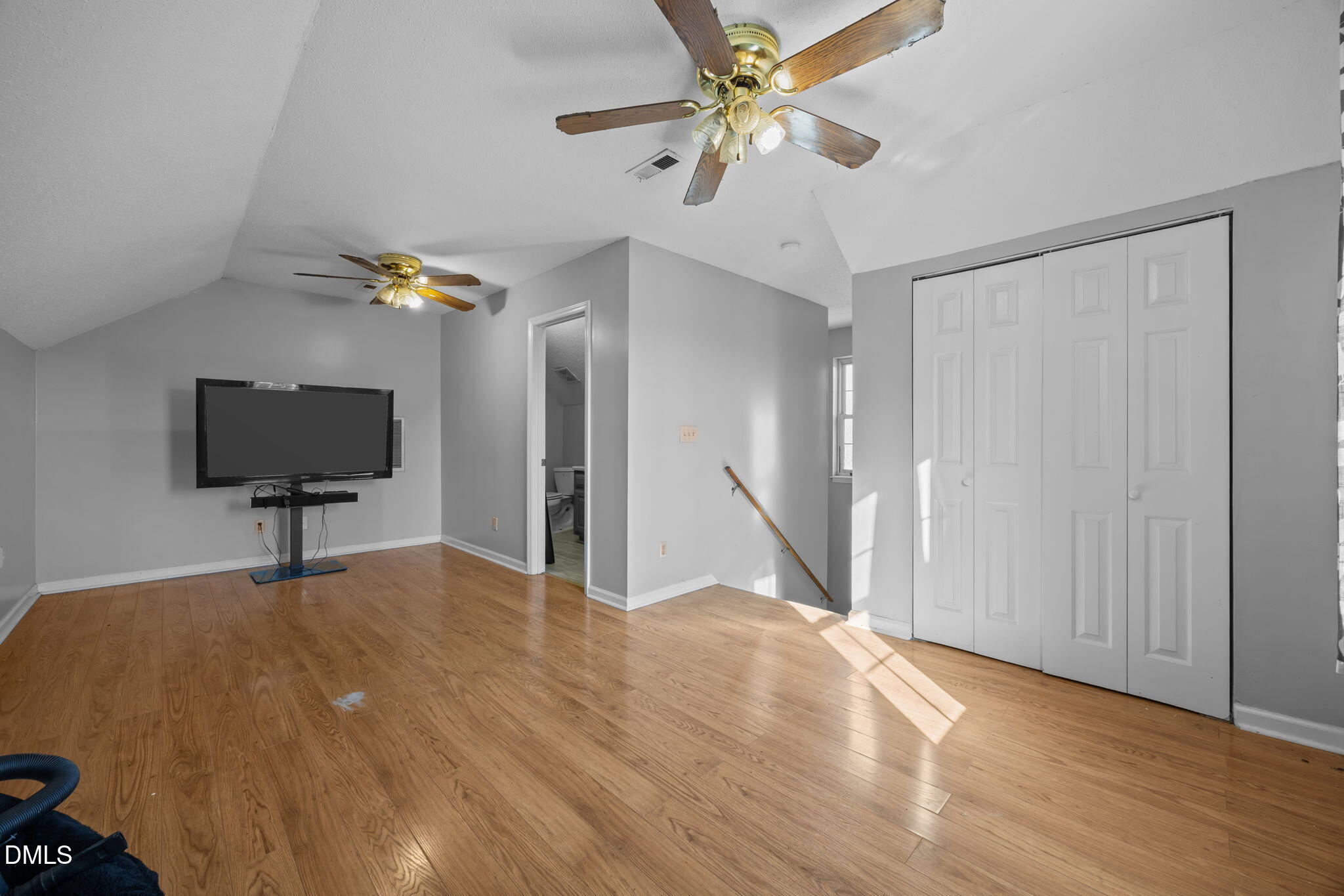 3431 Old Stage Road South Erwin, NC 28339 - Photo 45 of 53 a view of an empty room with a window and wooden floor