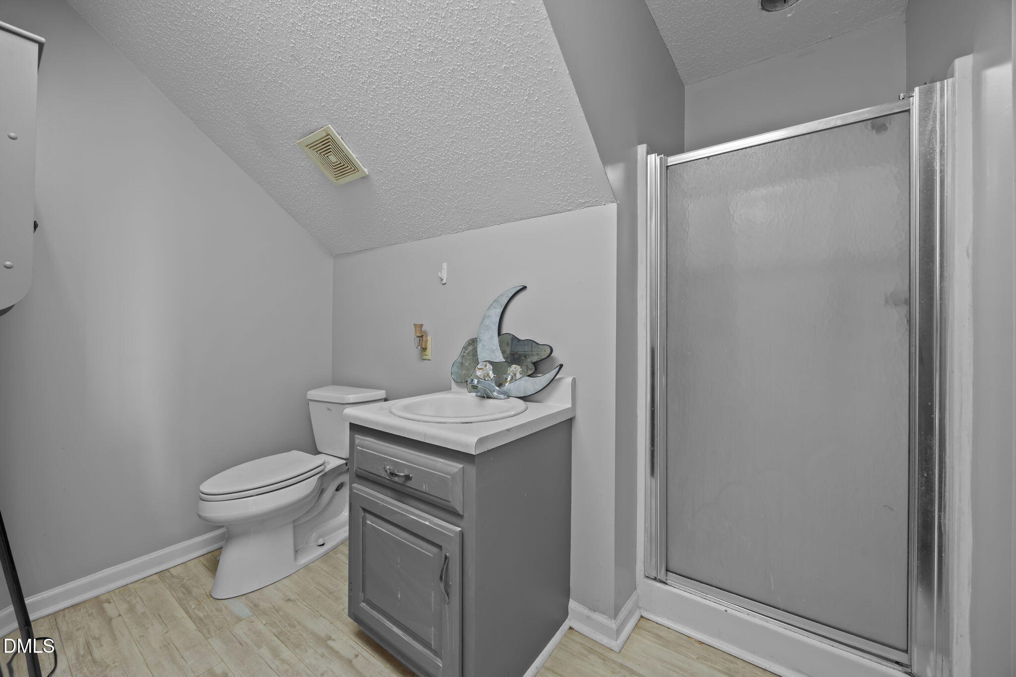 3431 Old Stage Road South Erwin, NC 28339 - Photo 46 of 53 a bathroom with a granite countertop sink toilet and a mirror
