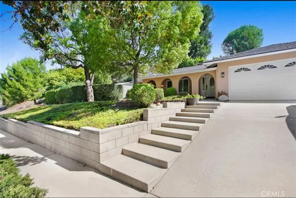 a front view of a house with porch