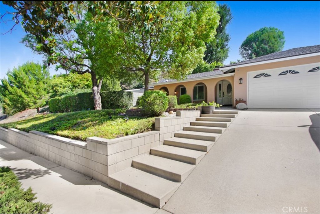 23847 Bower Cascade Place Diamond Bar, CA 91765 - Photo 1 of 4 a front view of a house with porch