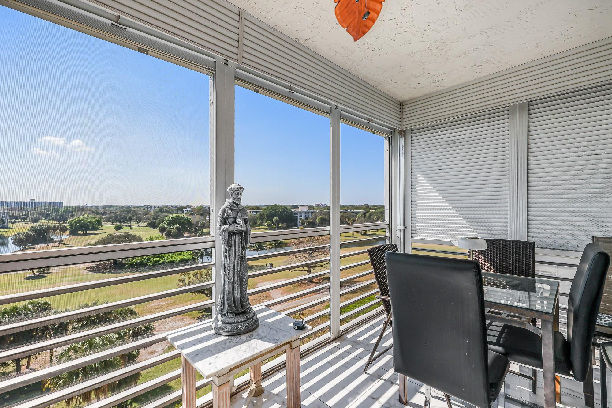 3520 Oaks Way, Unit 809 Pompano Beach, FL 33069 - Photo 17 of 39 Screened in to enjoy the summer breeze