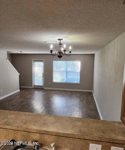 a view of a livingroom with a staircase