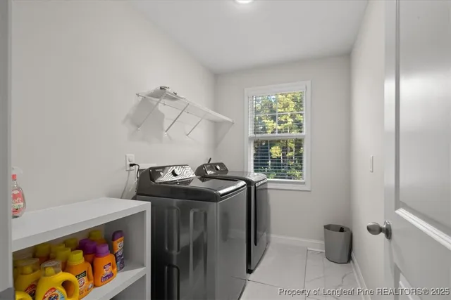 a view of an empty room and a window