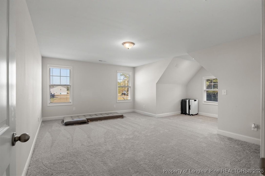 7840 Rufus Johnson Road Fayetteville, NC 28306 - Photo 32 of 50 an empty room with windows