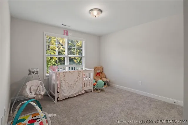 a bathroom with a sink double vanity and a mirror