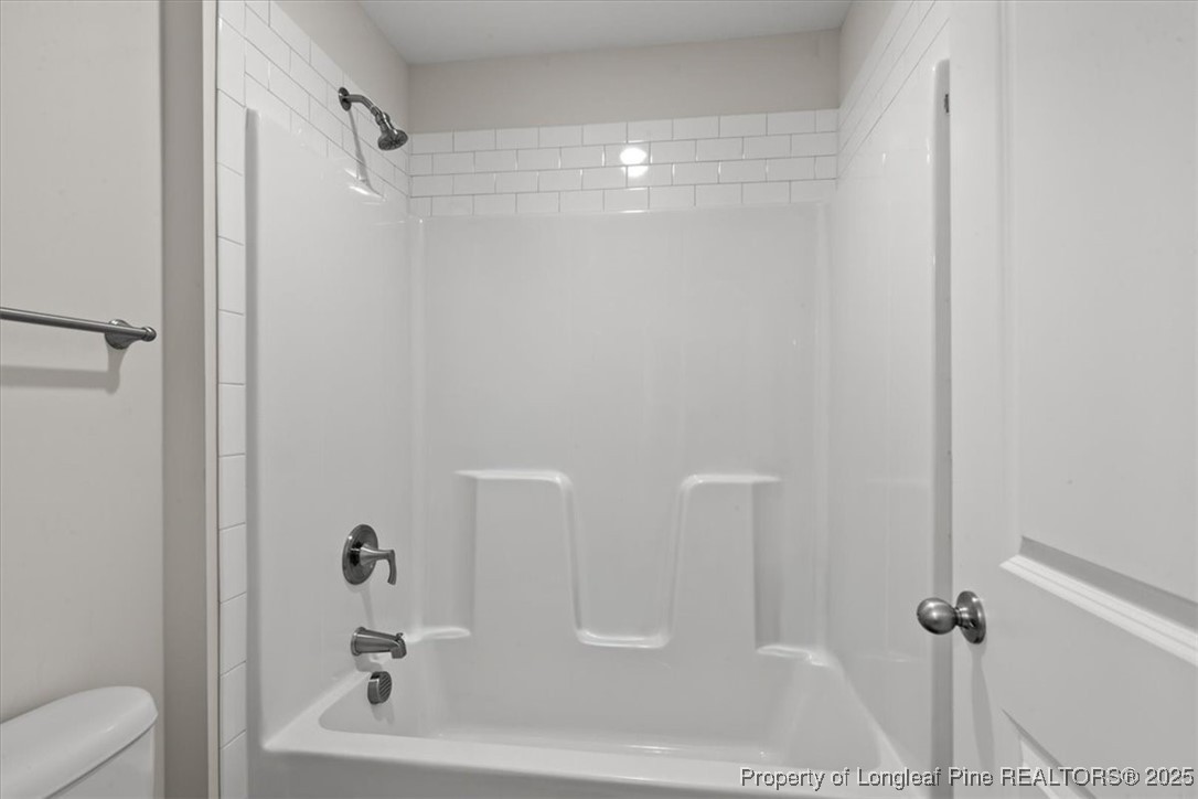 7840 Rufus Johnson Road Fayetteville, NC 28306 - Photo 38 of 50 a bathroom with a shower
