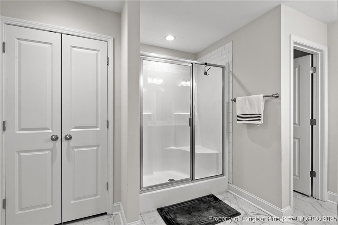 7840 Rufus Johnson Road Fayetteville, NC 28306 - Photo 44 of 50 a bathroom with a shower and toilet