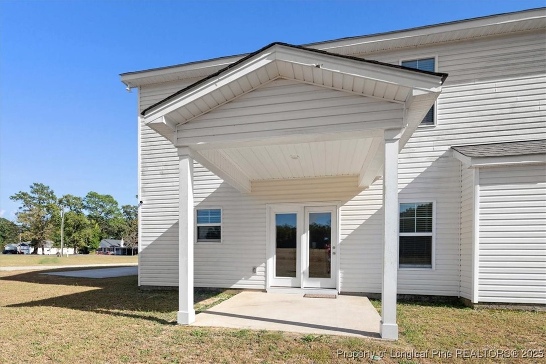 7840 Rufus Johnson Road Fayetteville, NC 28306 - Photo 49 of 50 a front view of a house with garden