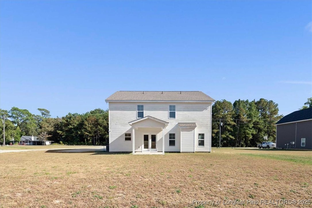7840 Rufus Johnson Road Fayetteville, NC 28306 - Photo 50 of 50 front view of a house with a yard