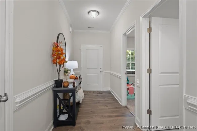 a view of entryway with wooden floor