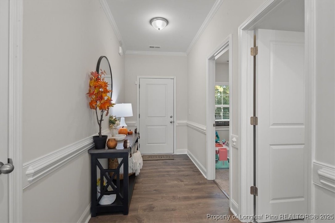 7840 Rufus Johnson Road Fayetteville, NC 28306 - Photo 9 of 50 a view of entryway with wooden floor