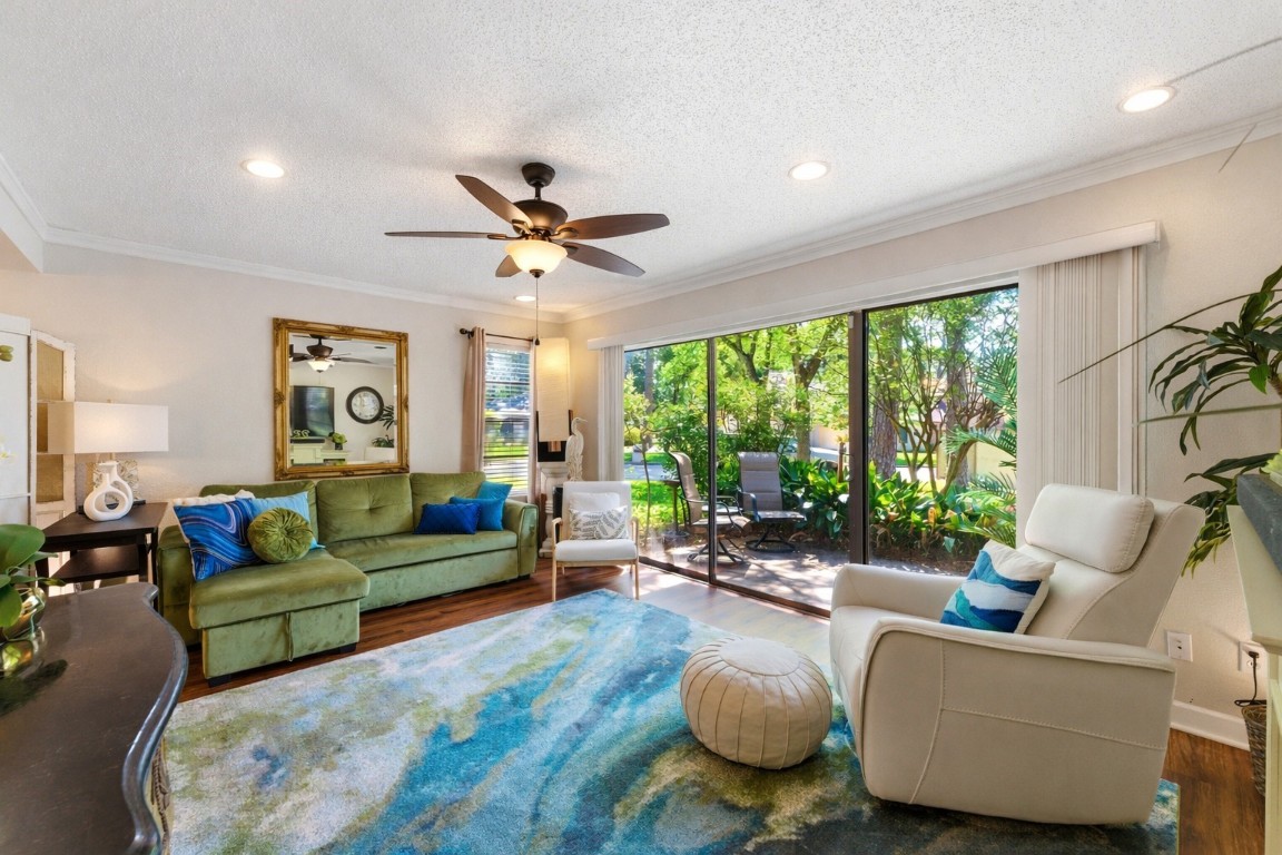12900 Walden Road, Unit 219B Montgomery, TX 77356 - Photo 11 of 41 a living room with furniture and a large window