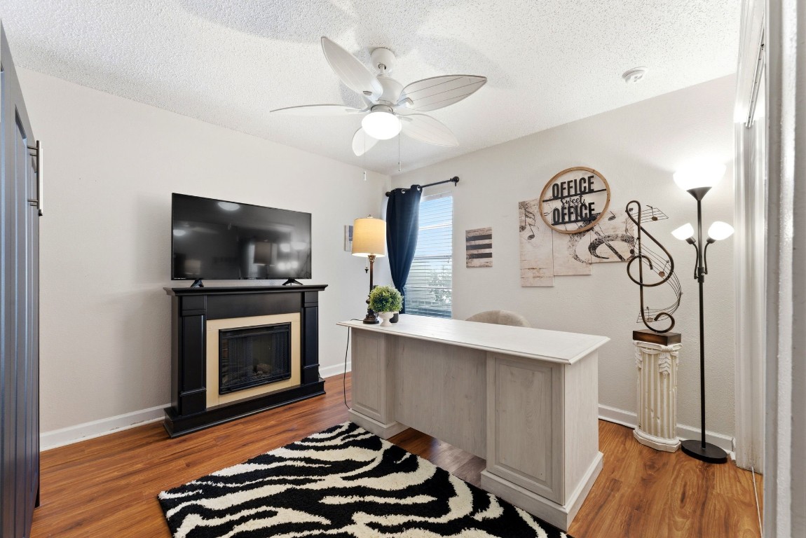 12900 Walden Road, Unit 219B Montgomery, TX 77356 - Photo 15 of 41 a living room with furniture and a flat screen tv