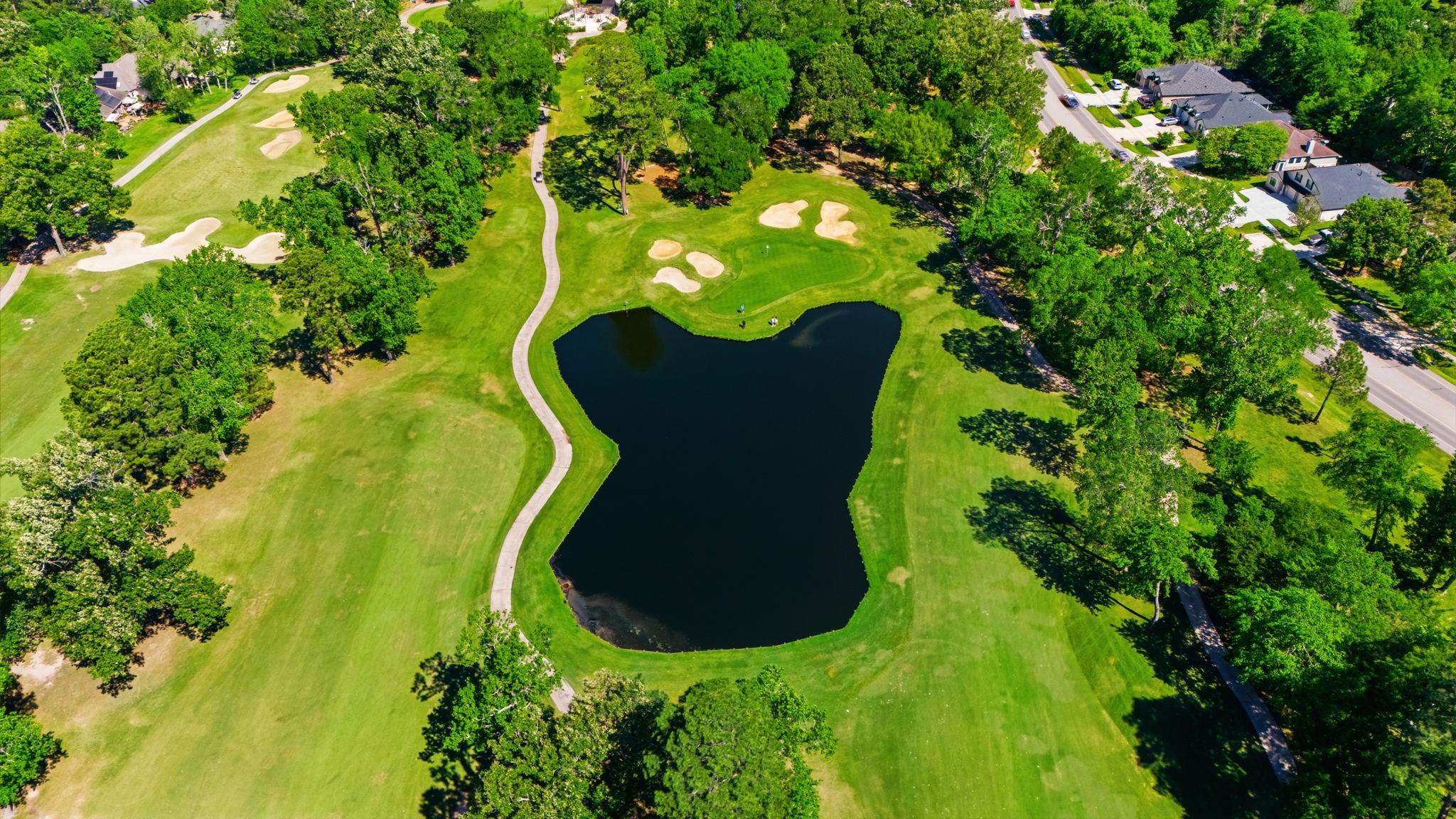 12900 Walden Road, Unit 219B Montgomery, TX 77356 - Photo 24 of 41 Known for its difficult layout and scenic lake views, it features a 73.1 course rating and 143 slope from the back tees, with the 11th hole frequently recognized among the top 500 in the world.