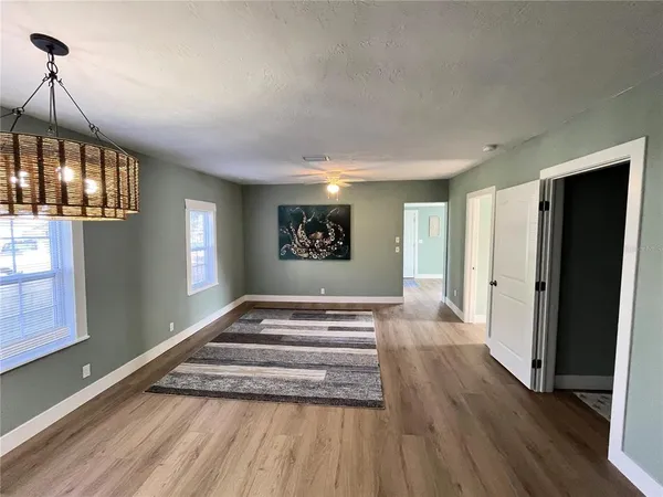 a view of an empty room and window