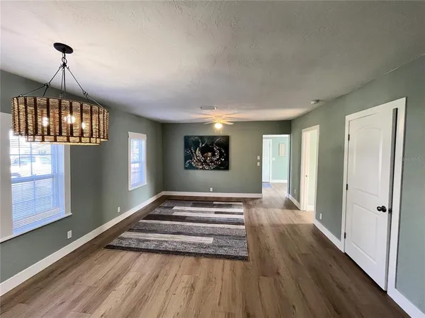 a view of an empty room and window