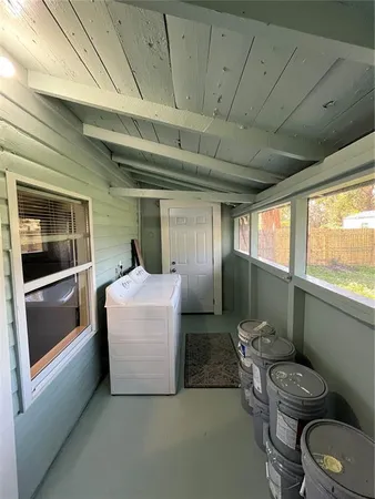 a living room with a couch and a table
