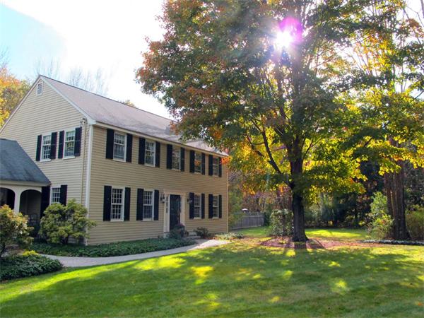 39 Highland Road Boxford, MA 01921 - Photo 1 of 30 a front view of a house with yard and green space