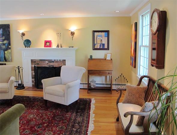 39 Highland Road Boxford, MA 01921 - Photo 12 of 30 a living room with furniture or couch and a fireplace