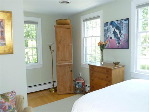 39 Highland Road Boxford, MA 01921 - Photo 15 of 30 a bedroom with a bed and a window