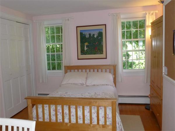 39 Highland Road Boxford, MA 01921 - Photo 16 of 30 a bedroom with a bed and a window