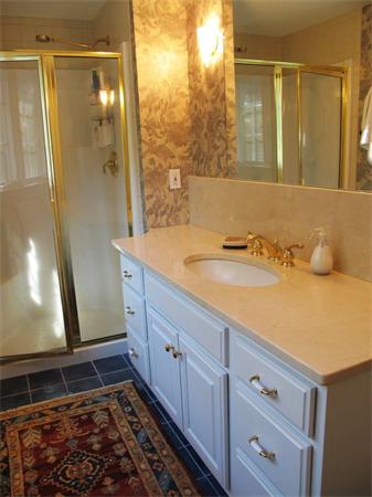 39 Highland Road Boxford, MA 01921 - Photo 20 of 30 a bathroom with a sink and a mirror